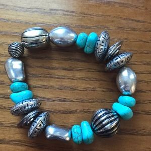 Turquoise and silver coloured bracelet